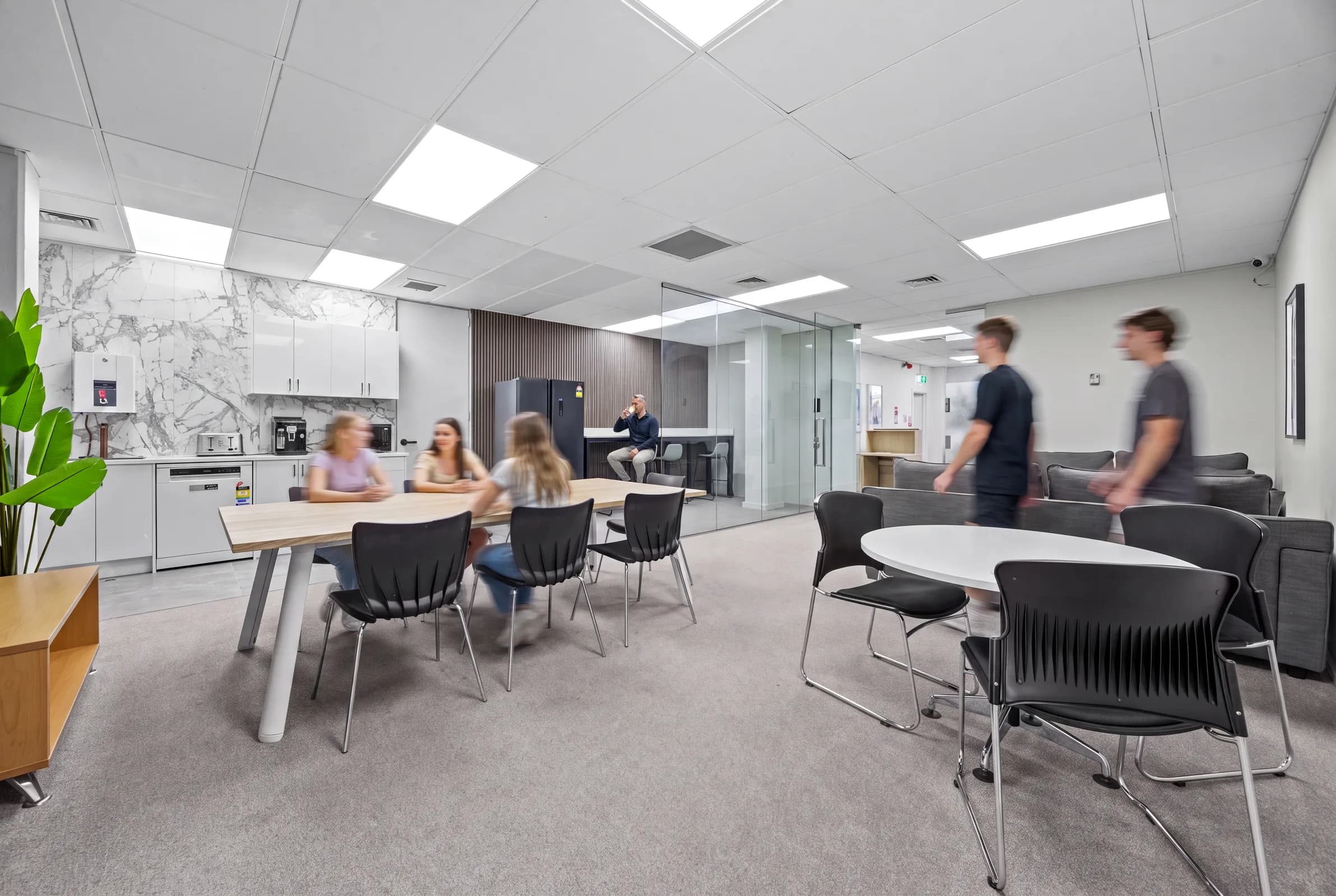 Office.101 members working together in the shared Penrose workspace